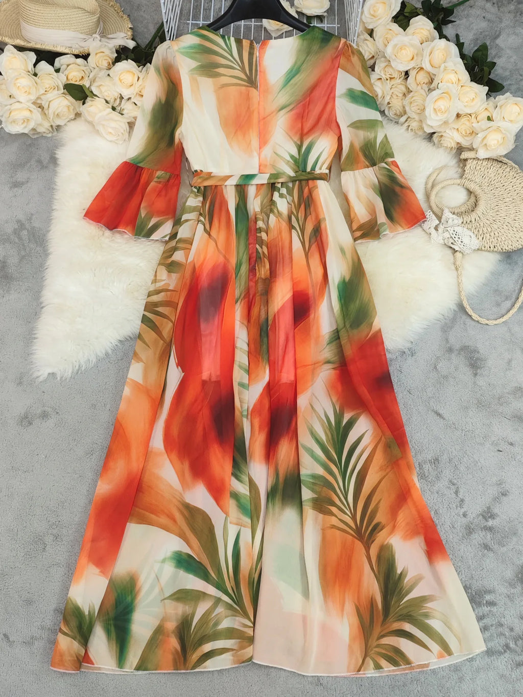 Elegant long women's dress by LAQTA featuring a flowing fabric and a stylish silhouette, perfect for formal occasions.