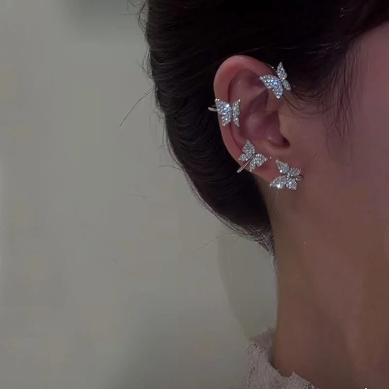 Korean style butterfly ear clips by LAQTA featuring delicate gold-tone metal and intricate butterfly design for stylish accessories.