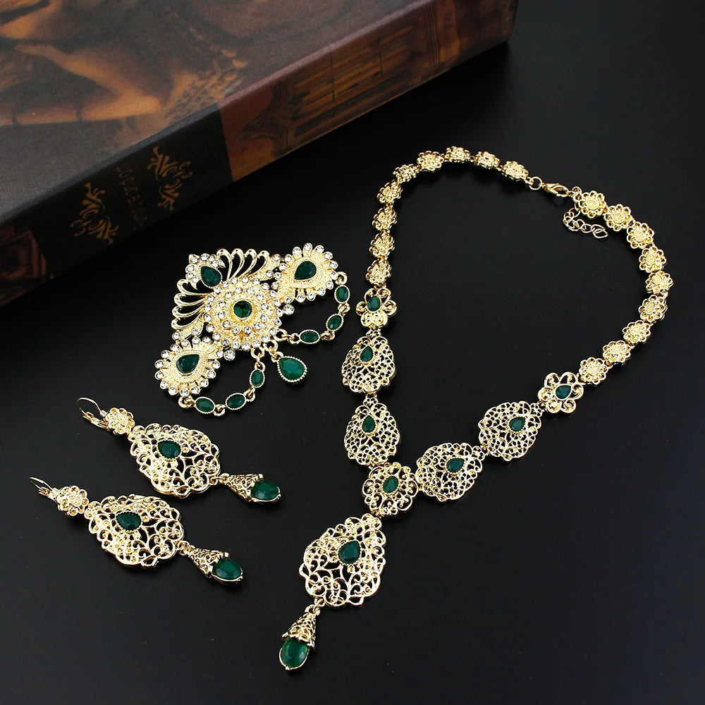 Elegant Moroccan bride jewelry set by LAQTA featuring intricate gold and gemstone embellishments for special occasions.