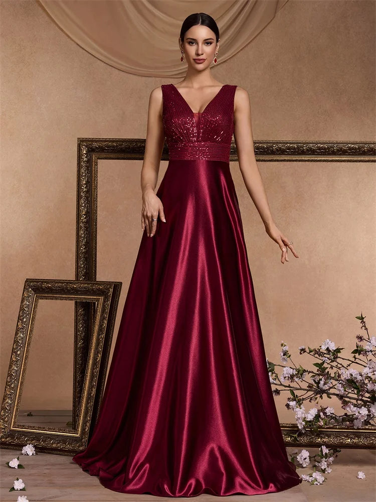 Elegant sequins evening dress by LAQTA featuring a fitted silhouette and shimmering embellishments for formal occasions.