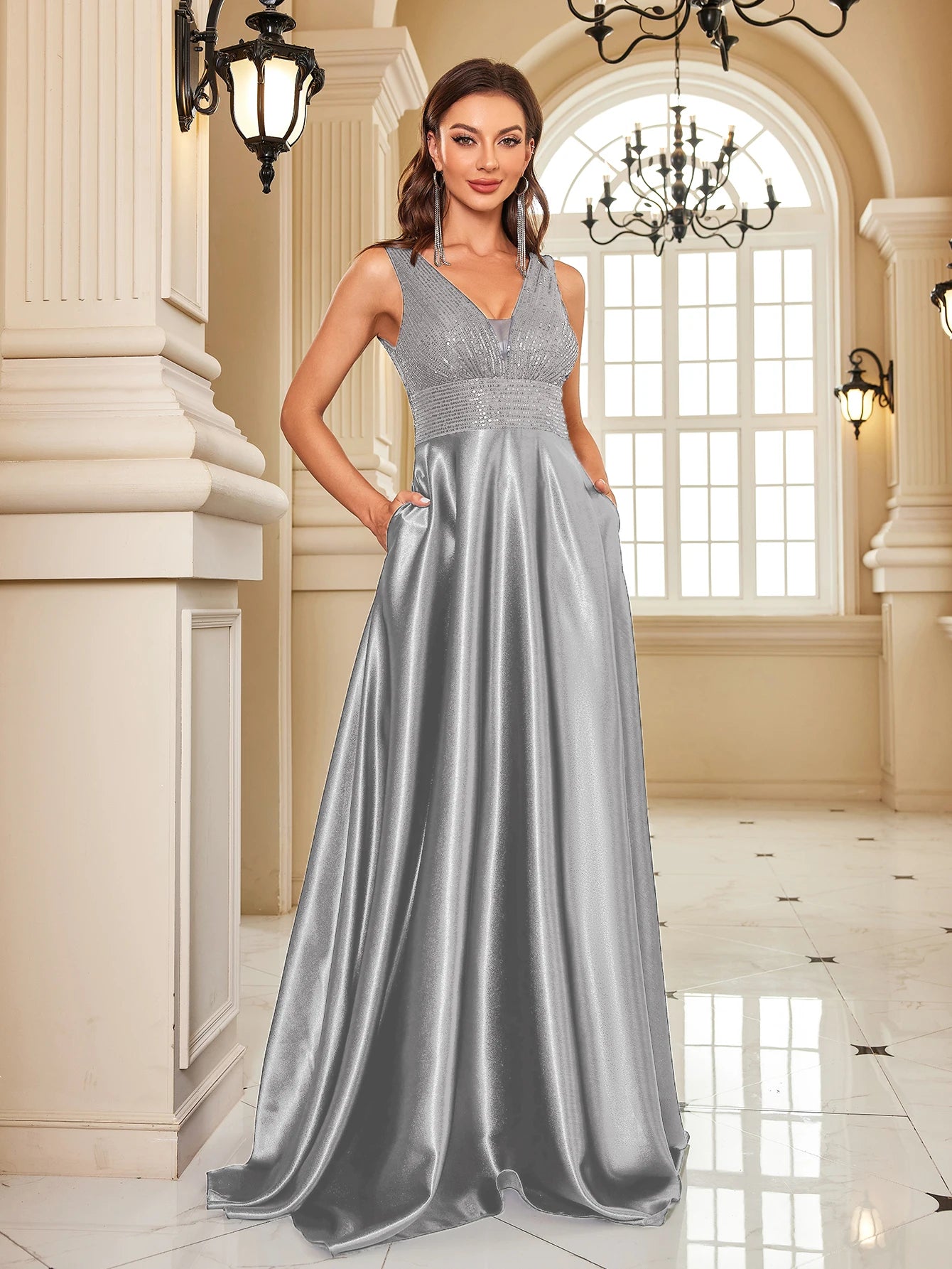 Elegant LAQTA sequins evening dress with intricate beadwork and a flowing silhouette, perfect for formal occasions.