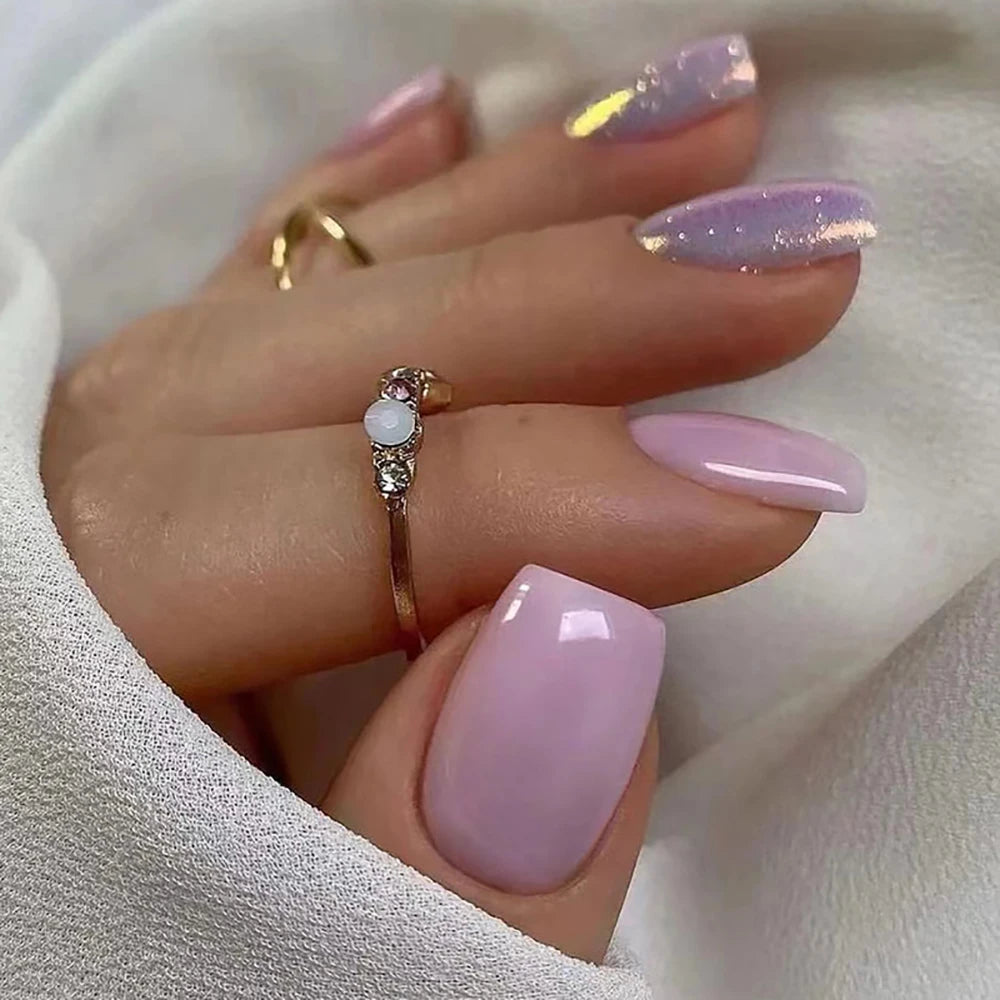 Short square fake nails by LAQTA featuring a sleek, modern design with a natural pink finish and smooth surface.