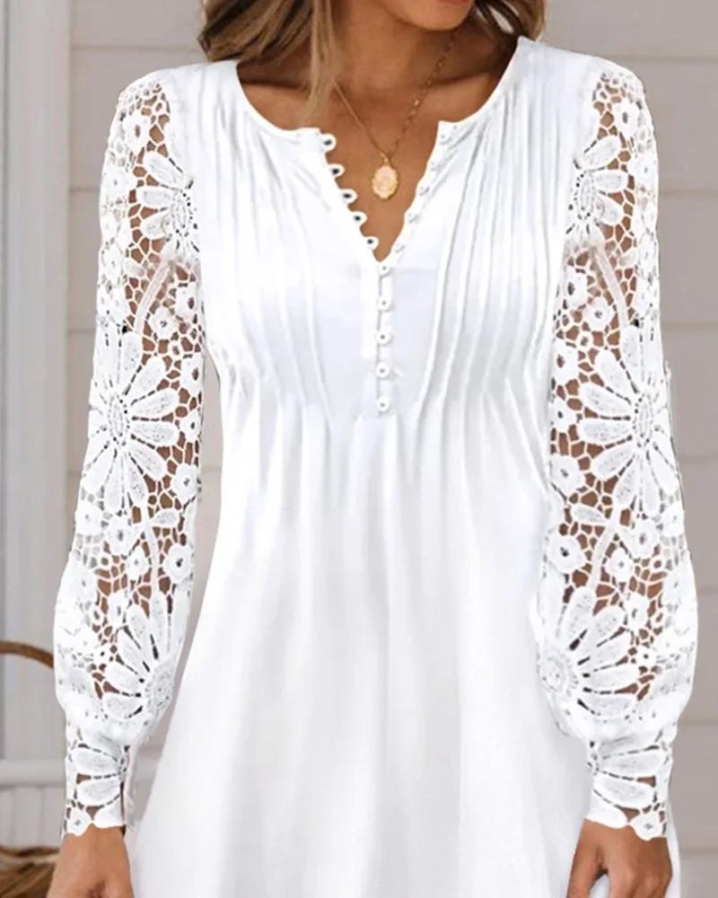 Elegant summer dress by LAQTA featuring lightweight fabric, floral pattern, and flowy design perfect for warm weather.