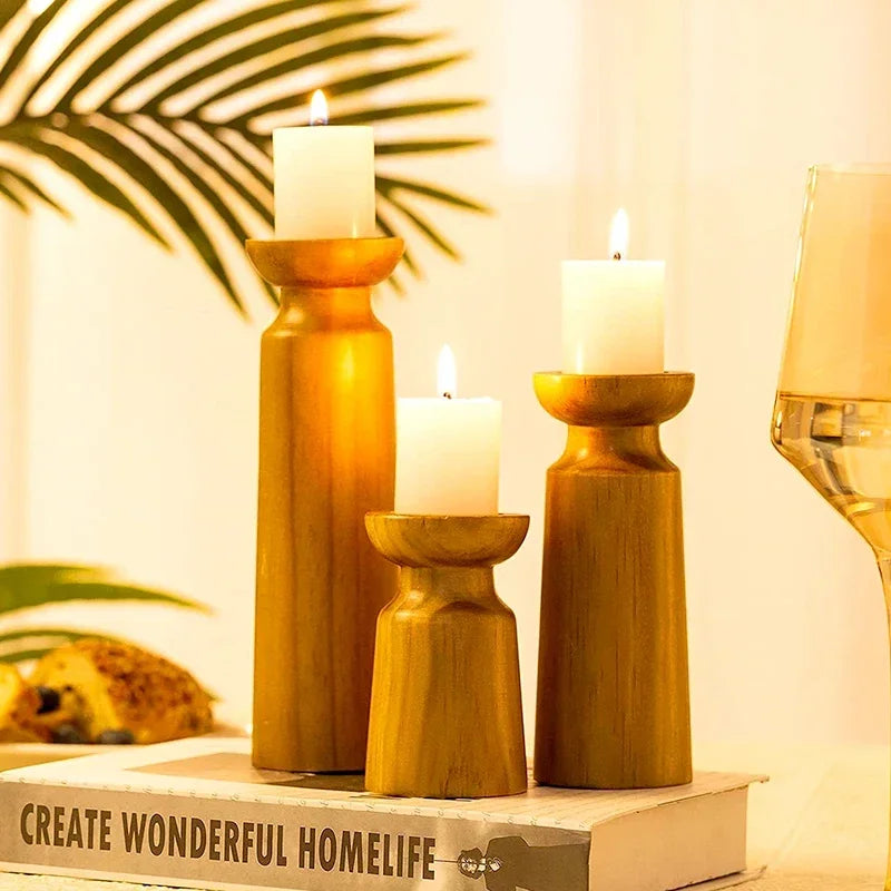 Natural wooden candlestick holders by LAQTA, featuring smooth finish and rustic design for home decor.