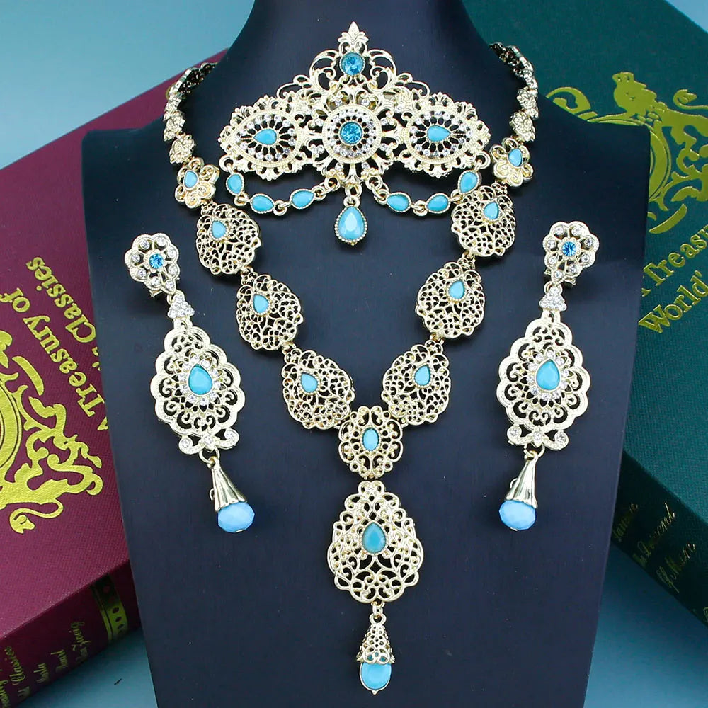 Elegant Arabic bride jewelry set by LAQTA featuring intricate gold and gemstone adornments for traditional wedding attire.
