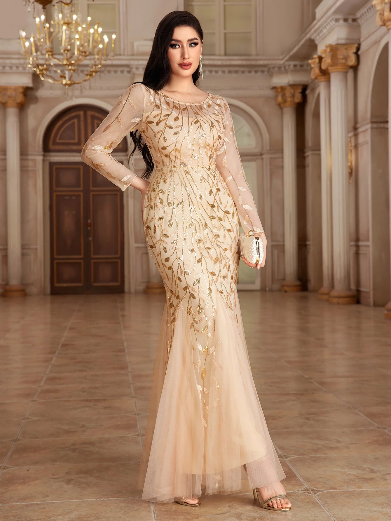 Elegant mermaid evening dress by LAQTA featuring a flowing design and intricate details for formal occasions.