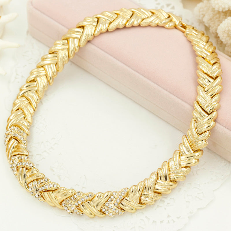 Elegant Dubai gold-colored bridal fashion jewelry by LAQTA featuring intricate design and traditional craftsmanship.
