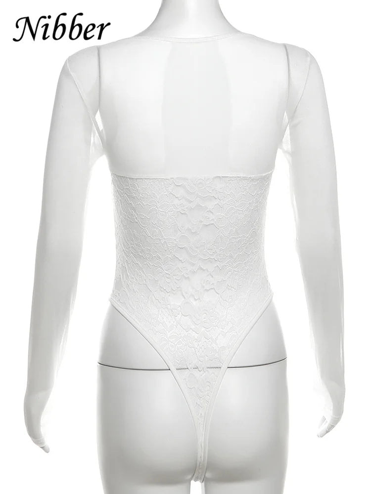 Woman wearing LAQTA letter print bodysuit with long sleeves and fitted design, showcasing casual and stylish fashion.