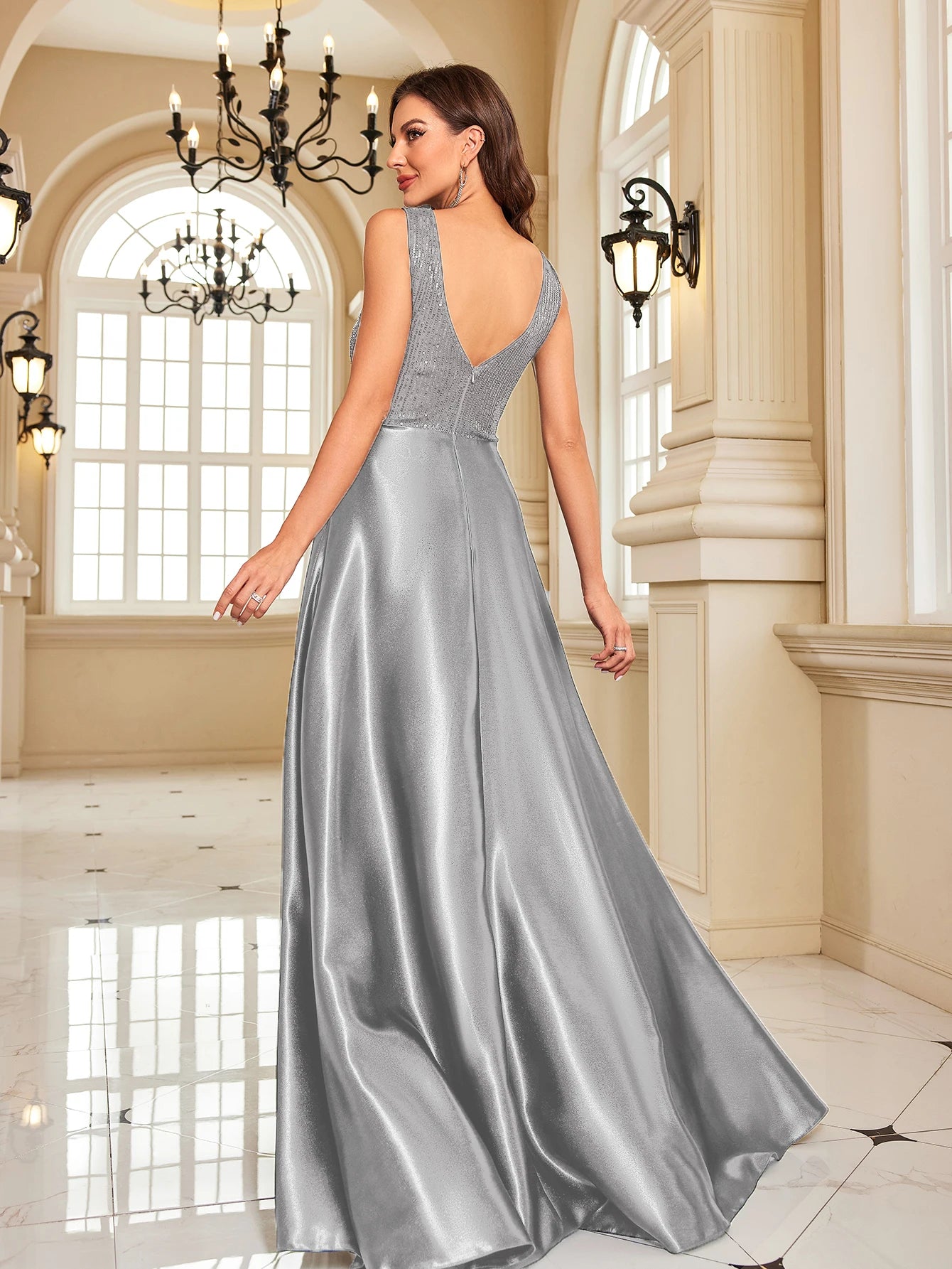 Elegant sequins evening dress by LAQTA featuring a fitted silhouette and shimmering embellishments for formal occasions.