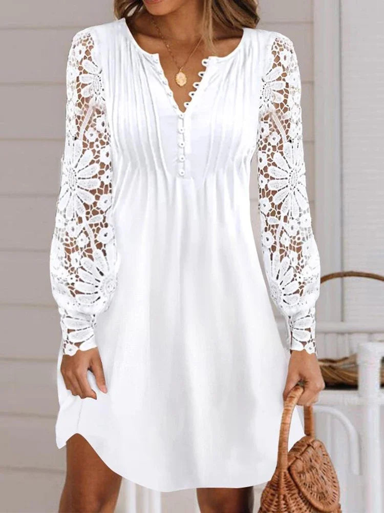 Elegant summer dress by LAQTA, featuring a lightweight fabric and stylish design, displayed on a mannequin.