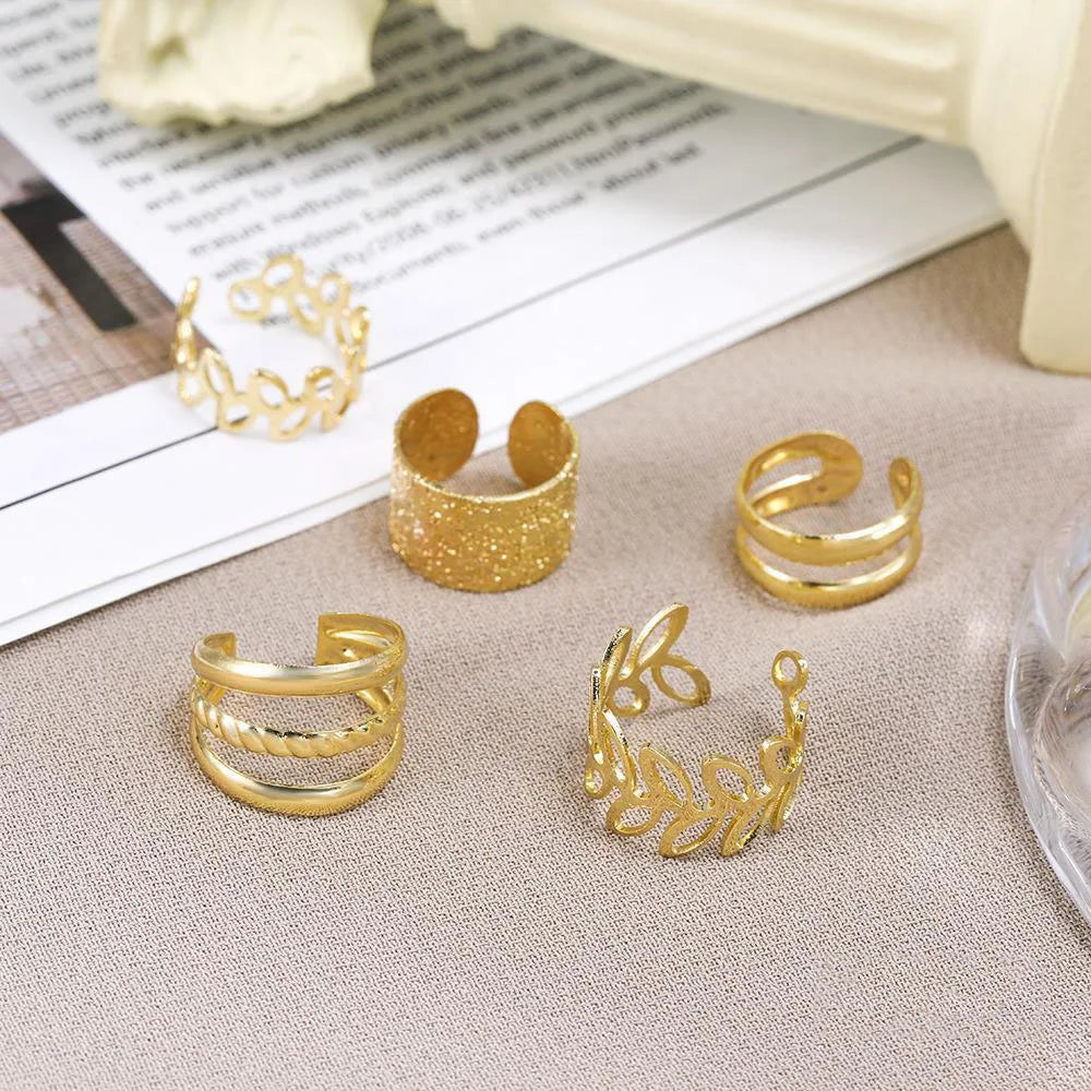 Set of LAQTA Retro Multi-element Leaf jewelry pieces featuring intricate leaf designs and mixed metal elements.