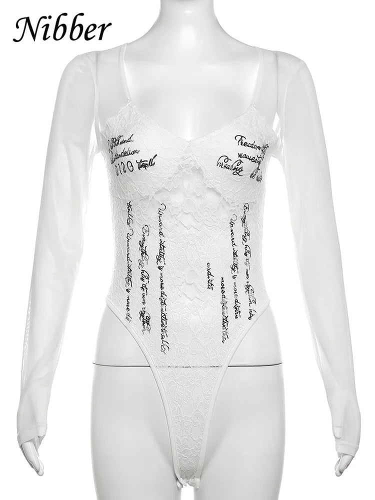 Woman wearing a LAQTA letter print bodysuit with long sleeves and a fitted design, showcasing a stylish casual look.