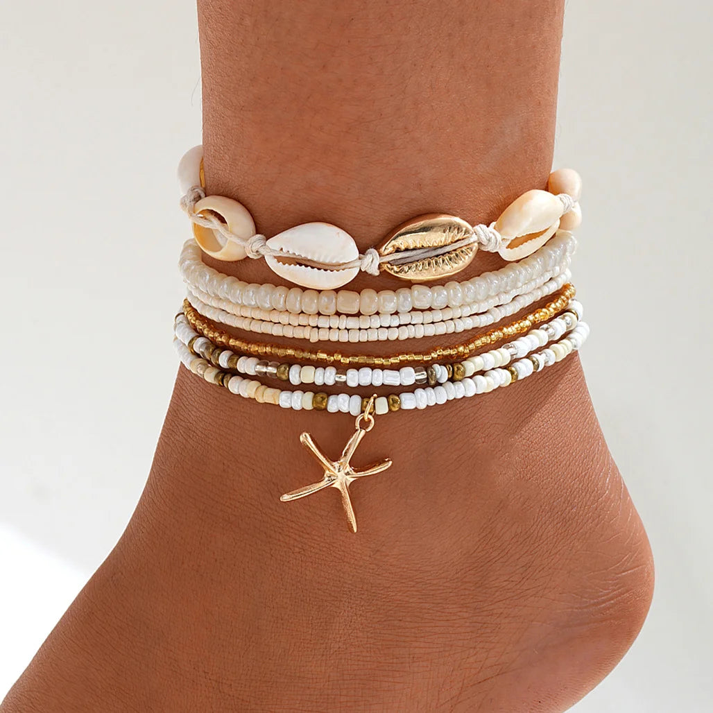 Elegant metal pendant anklet featuring intricate design and adjustable chain, perfect for stylish ankle jewelry by LAQTA.
