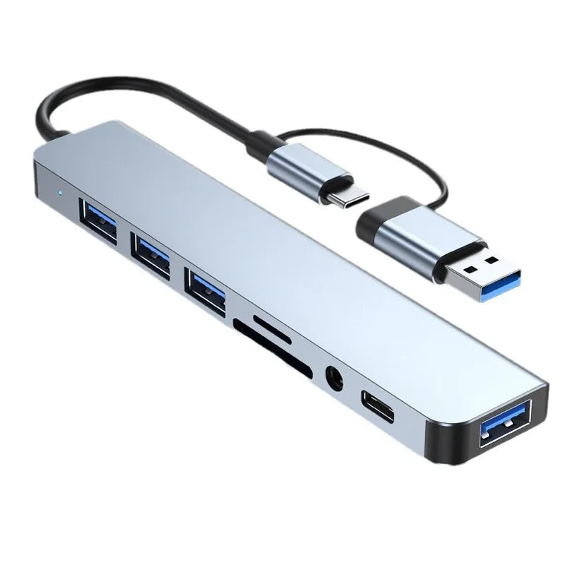 LAQTA 8-in-1 USB and Type C hub docking station with multiple ports including SD card slot and USB connectors.