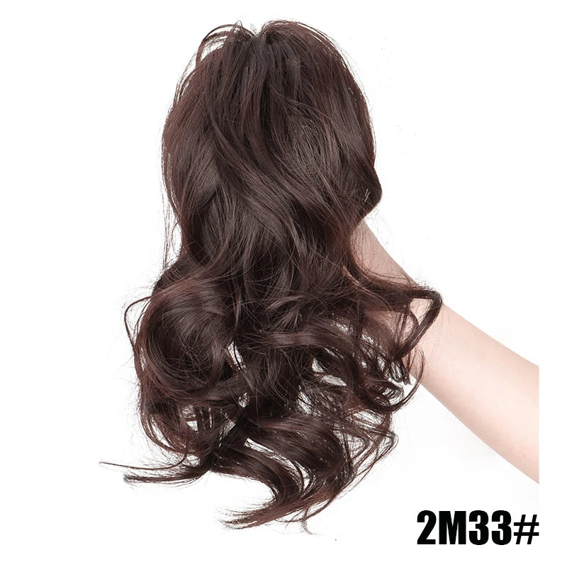 Short curly clip-in ponytail extension by LAQTA, featuring a natural curly texture and easy clip-in attachment for a stylish look.