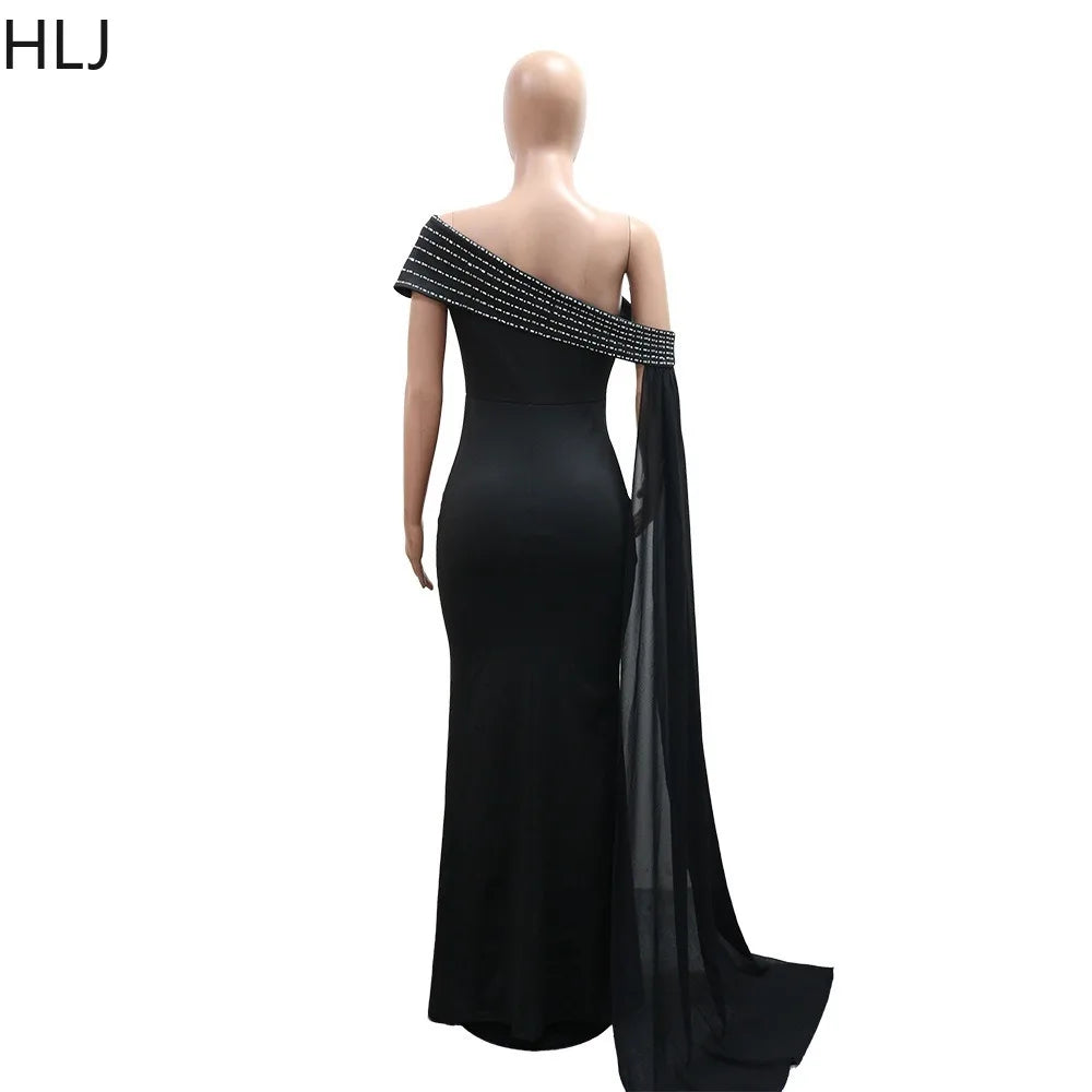 LAQTA sexy rhinestone patchwork bodycon long dress featuring elegant design and sparkling embellishments.