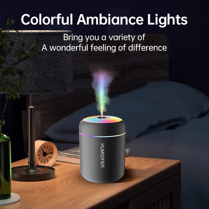 LAQTA 180ML mini air humidifier emitting a fine mist, compact design ideal for home or office use.