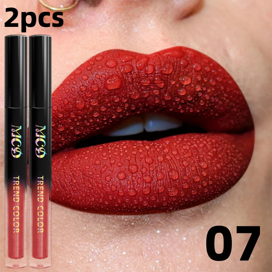 LAQTA matte velvet lip gloss in a sleek tube, showcasing its smooth, velvety texture and rich color shade.