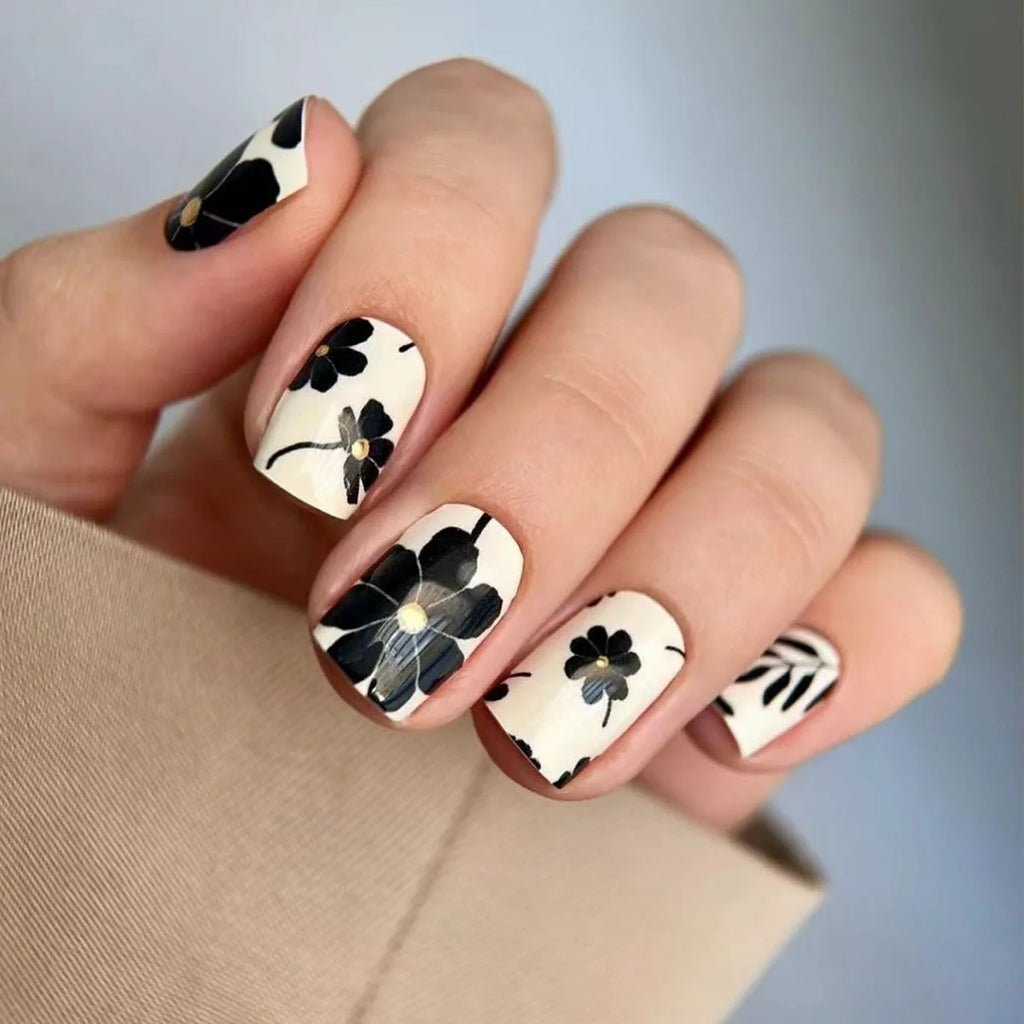 Short square fake nails by LAQTA, showcasing a set of stylish artificial nail tips with a smooth finish and modern design.