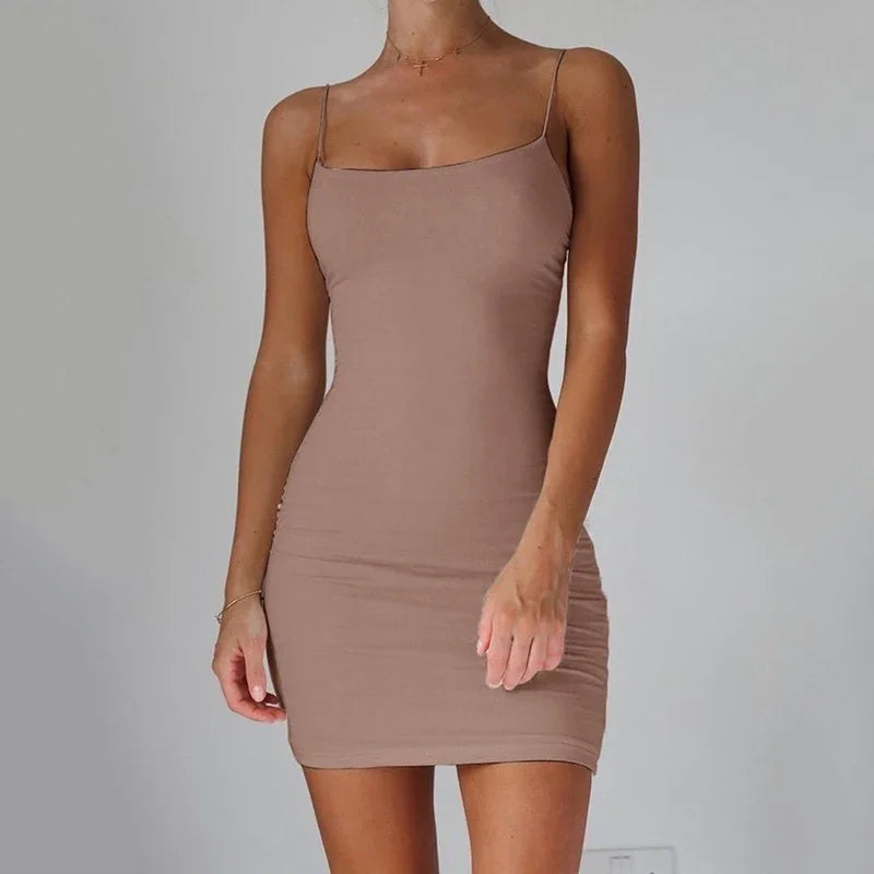 LAQTA summer spaghetti strap mini dress featuring a lightweight fabric and a stylish, casual design for warm weather wear.