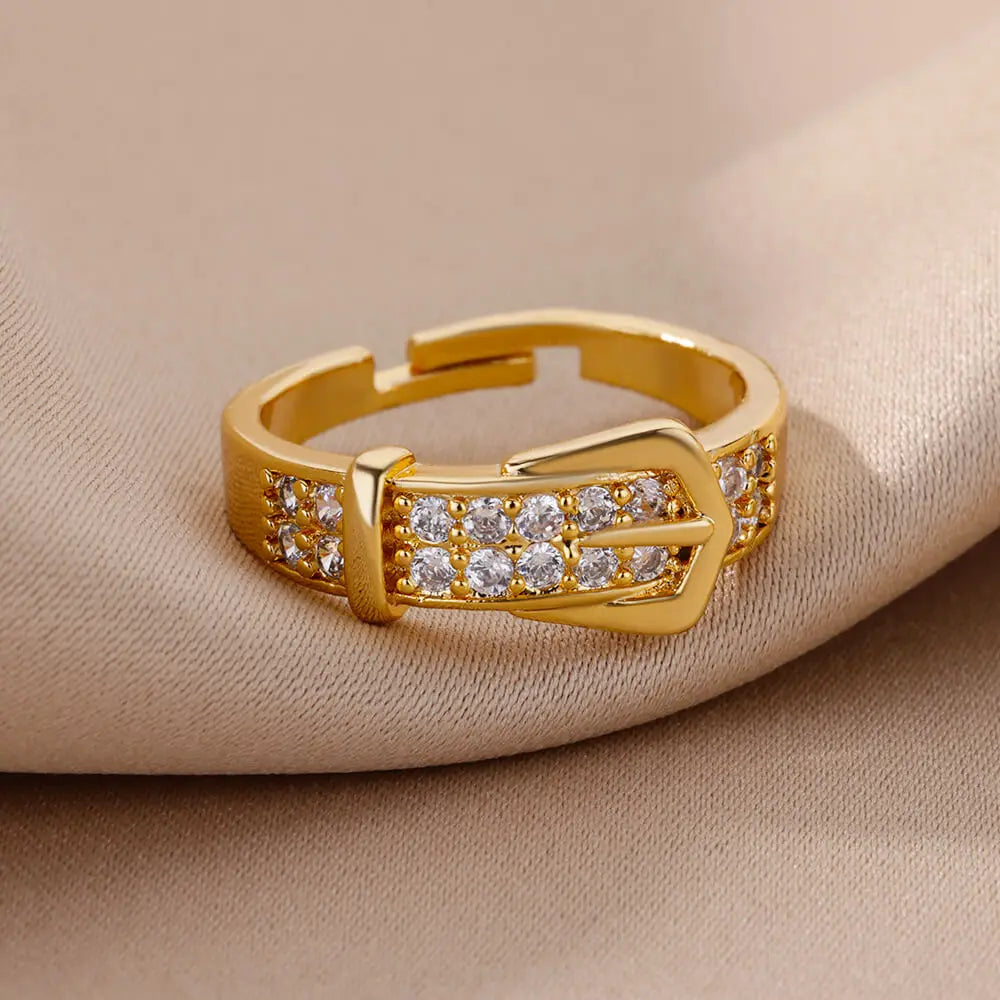 Elegant women's rings by LAQTA featuring intricate designs and shining metal, perfect for stylish accessories.