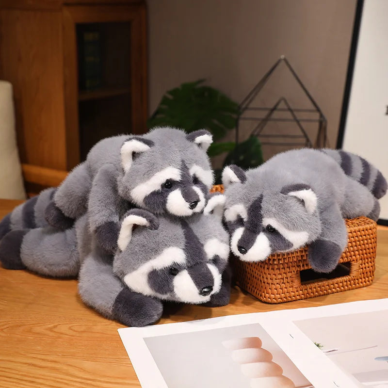Soft kawaii raccoon plush toy by LAQTA featuring a cute, cuddly raccoon with detailed fur and a playful expression.
