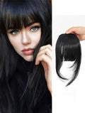 LAQTA synthetic hair clip with sleek design, showing the shiny, smooth texture of the hair accessory in a close-up image.