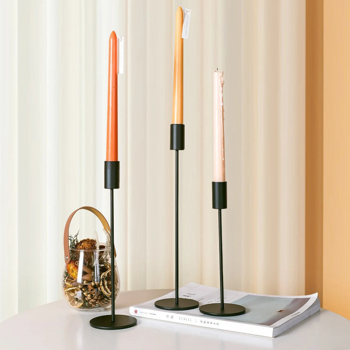 Elegant gold candlestick holder by LAQTA with intricate design, perfect for decorative table centerpieces and ambient lighting.