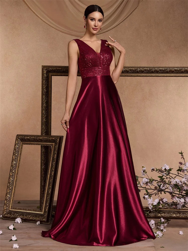 Elegant LAQTA sequins evening dress with intricate sequin detailing and flowing fabric, perfect for formal events.