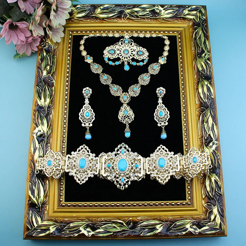 Elegant Chic Arabic bride jewelry set by LAQTA featuring intricate gold and gemstone designs for traditional wedding attire.