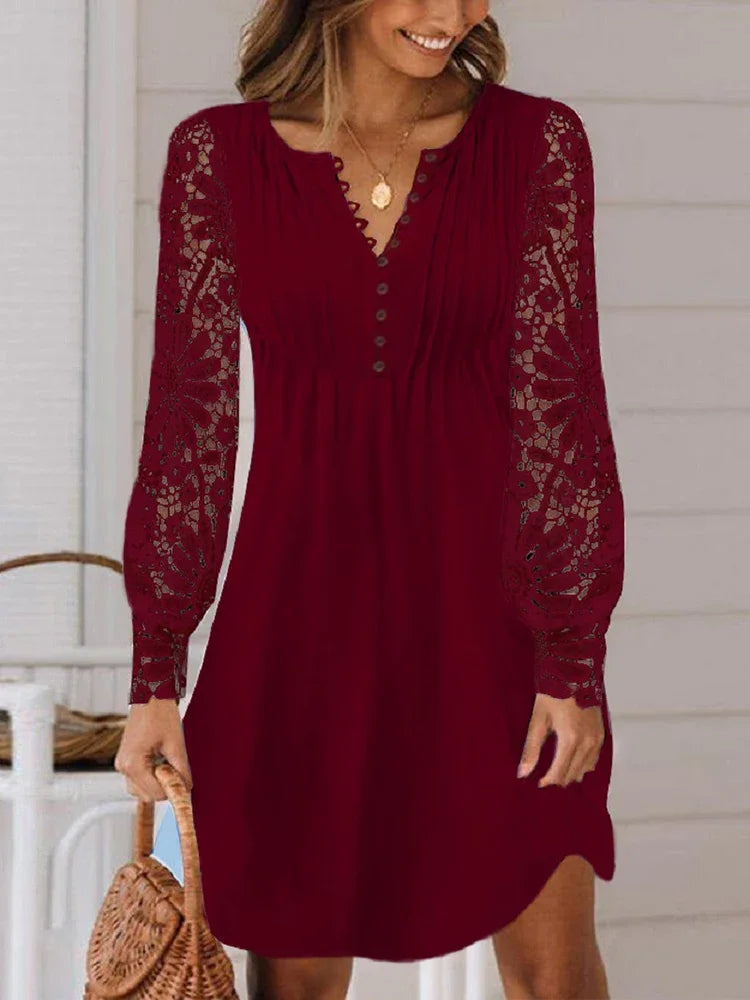 Elegant summer dress by LAQTA featuring a flowing fabric, sleeveless design, and vibrant floral pattern.