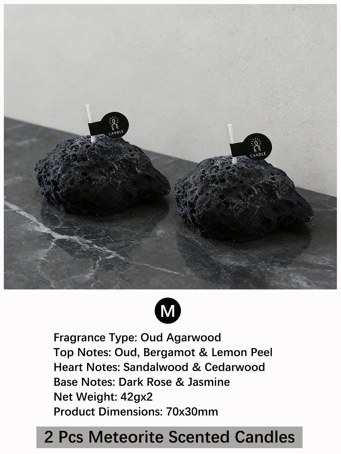 LAQTA Meteorite Scented Candle in a sleek glass holder with a lit wick, showcasing a warm, inviting glow.