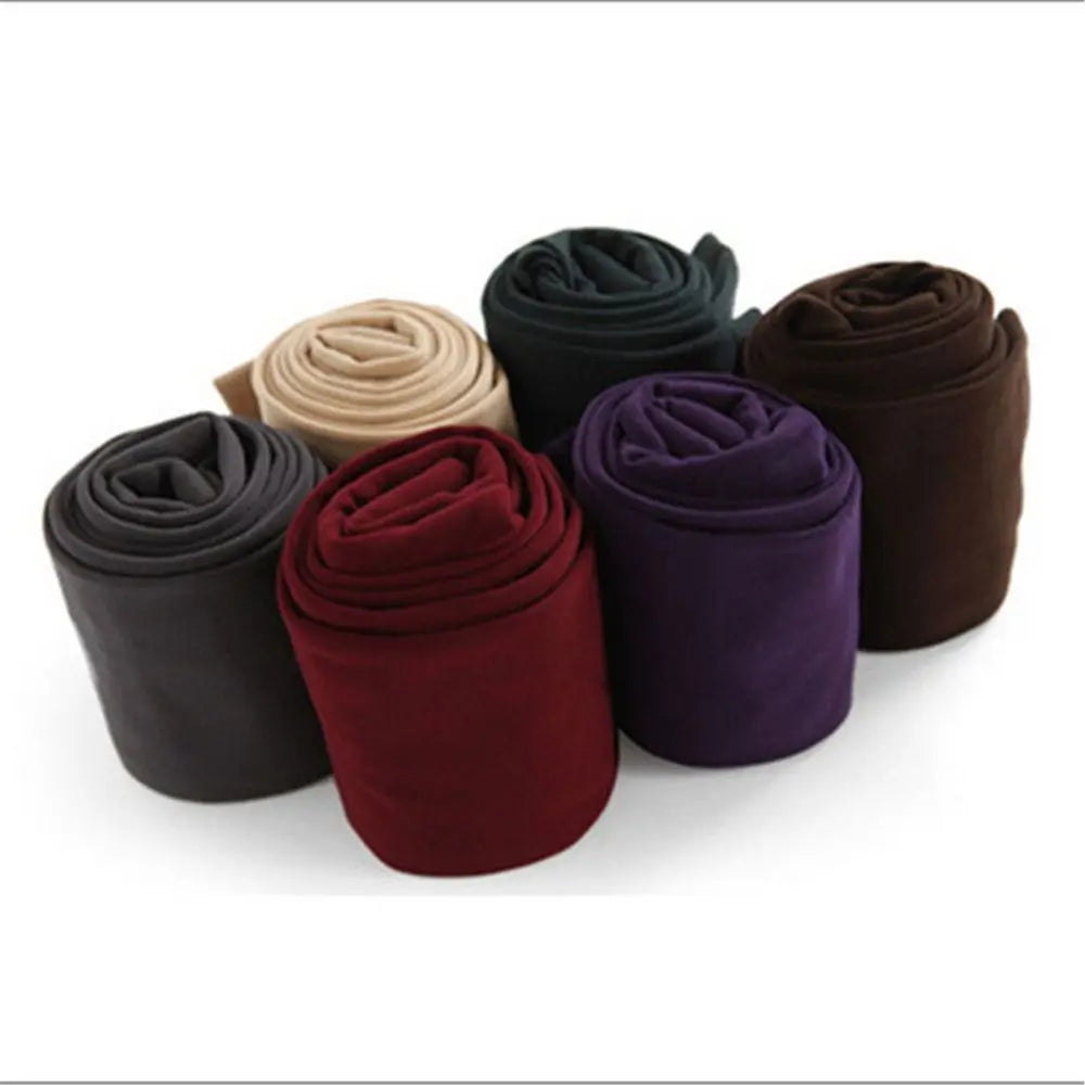 LAQTA fluff-lined stretch pantyhose displayed on a model, showcasing the soft, cozy material and comfortable fit.