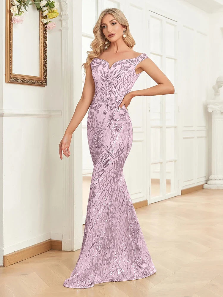Elegant V-neck silver sequins evening dress by LAQTA with intricate sequin detailing and a flowing silhouette.