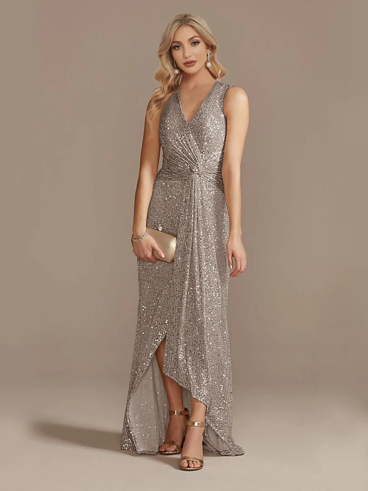 Elegant LAQTA evening dress with a flowing silhouette, intricate detailing, and a stylish neckline, perfect for formal occasions.