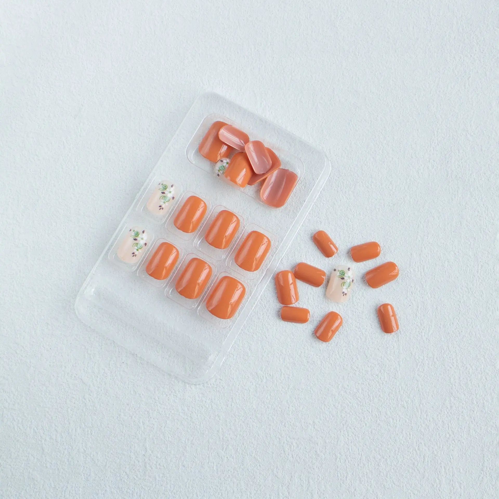 Short square fake nails by LAQTA with a sleek, modern design displayed in the image.