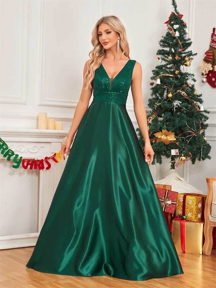 Elegant sequins evening dress by LAQTA featuring a fitted silhouette and shimmering embellishments for formal occasions.