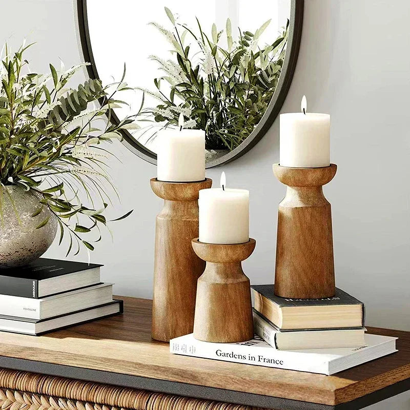 Natural wooden candlestick holders by LAQTA, featuring rustic wood texture and classic design for elegant home decor.